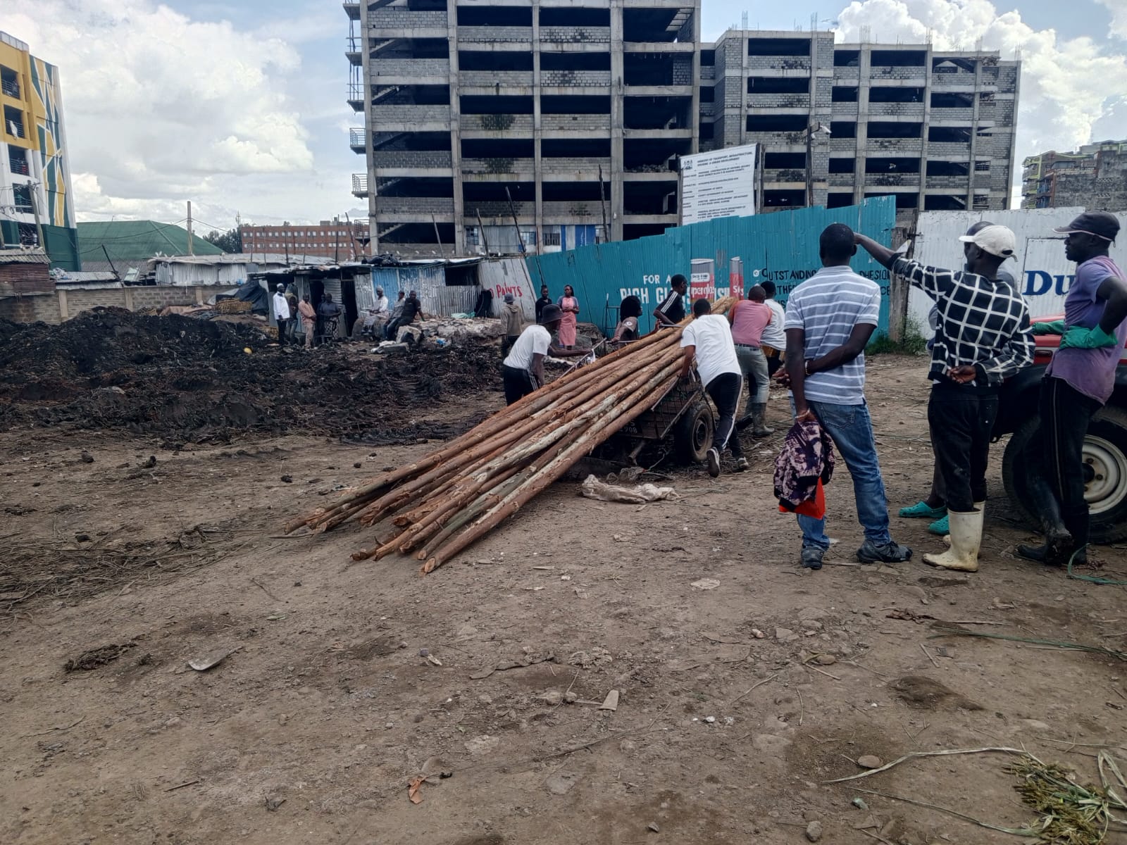 Millions paid for Gikomba fire station, but no work done - Workers place poles at the site in Gikomba Market, Nairobi, where the county government is planning to build a fire station, on April 17, 2024. (Photo: Charity Kilei)
