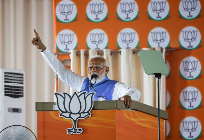 Modi's alliance to win big in India election, exit polls project